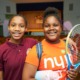 Quality afterschool is worth the investment — It changed my life_feature: two young black teens smile while one holds a tennis racket