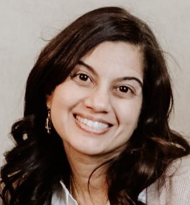 Sweta Asher headshot: woman with long dark hair smiling